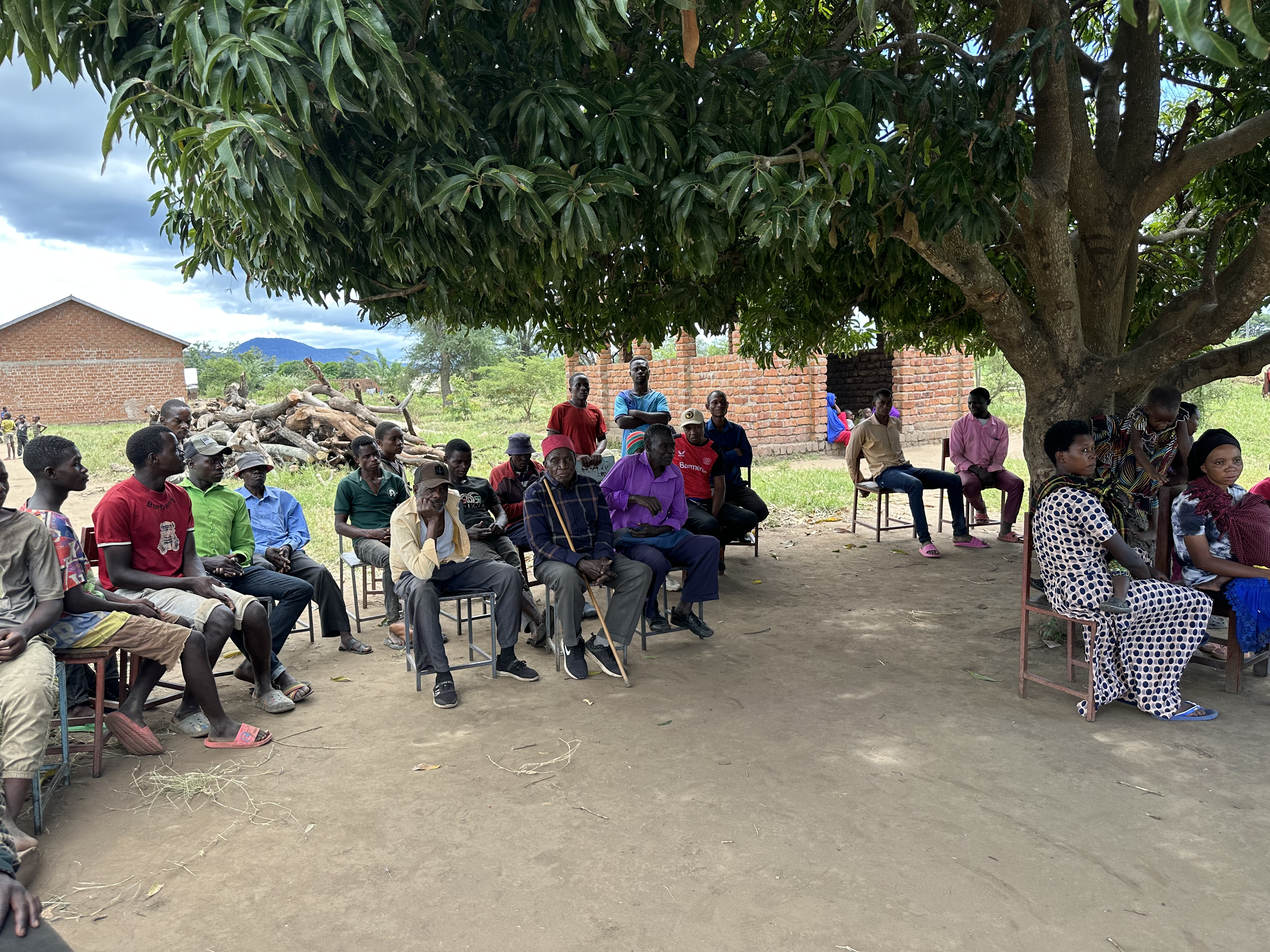 Adults engaged in a community-based learning session